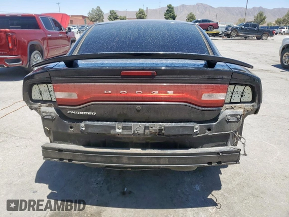 2013 Dodge Charger Police z VIN 2C3CDXAT2DH722403, wystawiony jako Copart lot #59879245 z przebiegiem 195 730 mil mil oraz Szkoda całkowita • Salvage title. Historia ofert i sprzedaży dostępna na DreamBid. Obrazek 6.