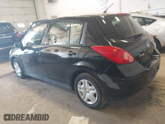 2012 Nissan Versa S with VIN 3N1BC1CP9CK248665, listed as a IAAI auction lot 41974293 with 146,465 mi miles. Bid and sale history available at carsss.com. Image 3.