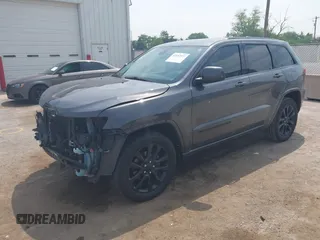 2018 Jeep Grand Cherokee Laredo E with VIN 1C4RJFAG7JC294905, listed as a IAAI auction lot 42452977 with 75,916 mi miles and . Bid and sale history available at DreamBid. Image 2.