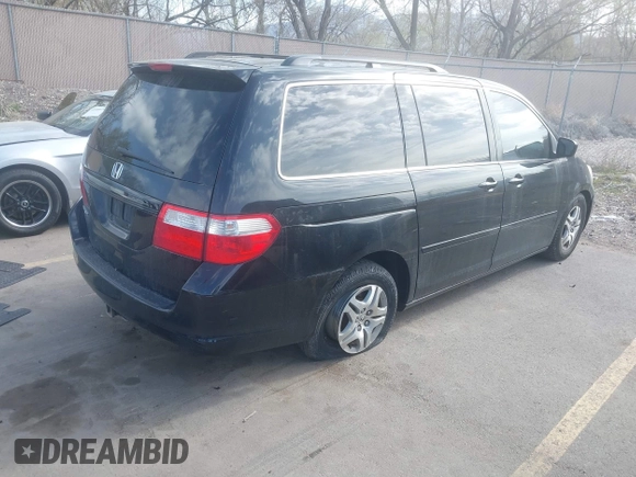 2007 Honda Odyssey EX-L with VIN 5FNRL38627B041332, listed as a IAAI auction lot 41934767 with 234,332 mi miles and . Bid and sale history available at carsss.com. Image 4.