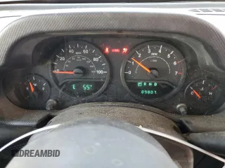 2009 Jeep Wrangler X with VIN 1J4FA24169L707695, listed as a Copart auction lot 49861955 with 89,807 mi miles and Salvage Title. Bid and sale history available at DreamBid. Image 9.