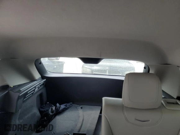 2022 Cadillac XT4 FWD Luxury z VIN 1GYAZAR47NF120348, wystawiony jako Copart lot #50187025 z przebiegiem 76 886 mil mil oraz Nie do naprawy • Non repairable. Historia ofert i sprzedaży dostępna na DreamBid. Obrazek 10.