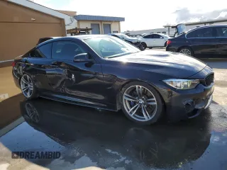 2019 BMW M4 with VIN WBS4Y9C57KAG67209, listed as a Copart auction lot 44204445 with 52,605 mi miles and Salvage Title. Bid and sale history available at carsss.com. Image 4.