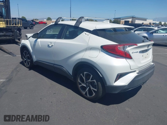 2019 Toyota C-HR XLE with VIN JTNKHMBX4K1040772, listed as a IAAI auction lot 41812031 with 79,729 mi miles. Bid and sale history available at carsss.com. Image 3.