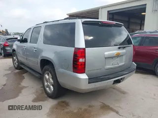2013 Chevrolet Suburban LT with VIN 1GNSCJE03DR164477, listed as a IAAI auction lot 42083985 with 150,540 mi miles and . Bid and sale history available at DreamBid. Image 3.