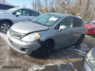 2011 Nissan Versa 1.8 S with VIN 3N1BC1CP2BL485409, listed as a IAAI auction lot 41595888 with 207,121 mi miles. Bid and sale history available at carsss.com. Image 2.