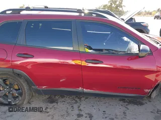 2017 Jeep Cherokee Altitude with VIN 1C4PJLABXHW661153, listed as a IAAI auction lot 41058821 with 167,418 mi miles and . Bid and sale history available at DreamBid. Image 14.