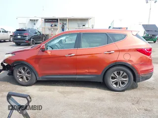 2014 Hyundai Santa Fe z VIN 5XYZTDLB0EG208769, wystawiony jako IAAI lot #42485411 z przebiegiem 82 173 mil mil oraz . Historia ofert i sprzedaży dostępna na DreamBid. Obrazek 14.