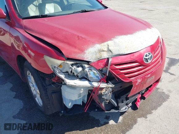 2007 Toyota Camry CE with VIN JTNBE46K073031988, listed as a IAAI auction lot 42062321 with 238,925 mi miles. Bid and sale history available at carsss.com. Image 6.