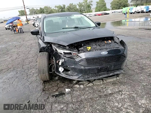 2018 Ford Focus SE with VIN 1FADP3FE8JL300246, listed as a Copart auction lot 59585035 with 83,141 mi miles and Salvage title. Bid and sale history available at DreamBid. Image 13.