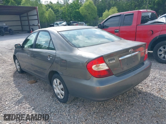2003 Toyota Camry LE with VIN 4T1BE32K03U727447, listed as a IAAI auction lot 42118785 with 325,881 mi miles and . Bid and sale history available at DreamBid. Image 3.