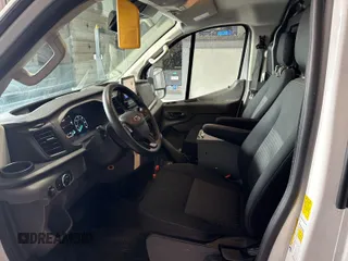 2020 Ford Transit Cargo z VIN 1FTBR2YG5LKA32432, wystawiony jako IAAI lot #42493895 z przebiegiem 134 672 mil mil oraz . Historia ofert i sprzedaży dostępna na DreamBid. Obrazek 28.