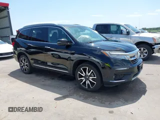 2019 Honda Pilot Touring 7-Passenger with VIN 5FNYF6H67KB031988, listed as a IAAI auction lot 42519588 with 41,368 mi miles and . Bid and sale history available at DreamBid. Image 1.