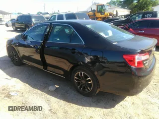 2012 Toyota Camry L with VIN 4T1BF1FK4CU002252, listed as a IAAI auction lot 42201973 with 261,460 mi miles. Bid and sale history available at carsss.com. Image 3.