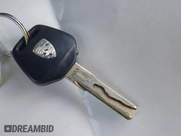 1999 Porsche Boxster with VIN WP0CA2986XU627495, listed as a IAAI auction lot 42112724 with 94,090 mi miles and . Bid and sale history available at DreamBid. Image 11.