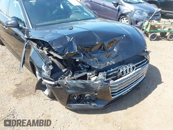 2018 Audi A5 Sportback Premium z VIN WAUANCF53JA003557, wystawiony jako IAAI lot #42079150 z przebiegiem 78 259 mil mil oraz . Historia ofert i sprzedaży dostępna na DreamBid. Obrazek 6.
