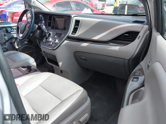 2015 Toyota Sienna XLE with VIN 5TDYK3DC1FS611521, listed as a IAAI auction lot 42136356 with 102,734 mi miles. Bid and sale history available at carsss.com. Image 5.