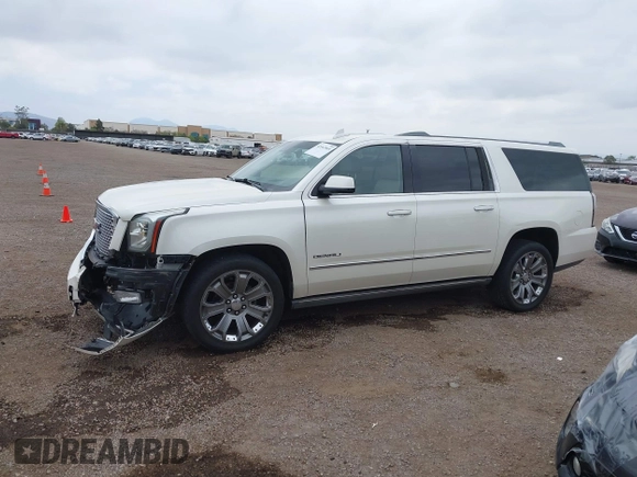2015 GMC Yukon XL Denali with VIN 1GKS2JKJ7FR641430, listed as a IAAI auction lot 42163969 with 129,085 mi miles. Bid and sale history available at carsss.com. Image 14.