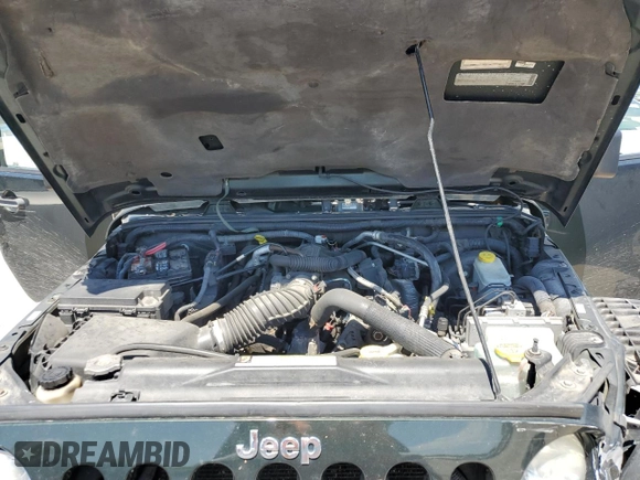 2010 Jeep Wrangler Rubicon with VIN 1J4BA6D12AL221220, listed as a Copart auction lot 56057055 with 200,346 mi miles and Salvage title. Bid and sale history available at DreamBid. Image 11.