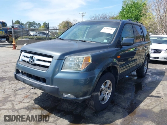2006 Honda Pilot EX with VIN 2HKYF18416H529290, listed as a IAAI auction lot 41915915 with 135,385 mi miles and . Bid and sale history available at DreamBid. Image 17.