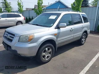 2006 Honda Pilot EX with VIN 2HKYF18446H000383, listed as a IAAI auction lot 42129875 with 206,723 mi miles and . Bid and sale history available at DreamBid. Image 2.