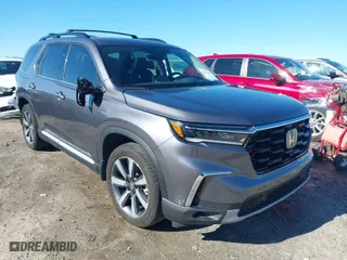 2024 Honda Pilot Touring with VIN 5FNYG1H70RB025789, listed as a IAAI auction lot 41843619 with 27,516 mi miles. Bid and sale history available at carsss.com. Image 1.