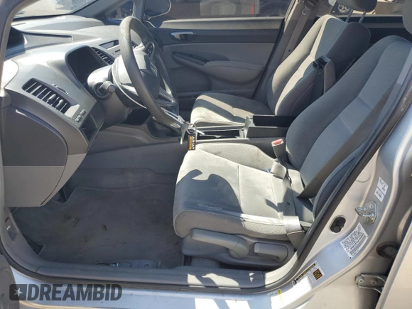 2010 Honda Civic LX with VIN 2HGFA1F51AH306669, listed as a Copart auction lot 50450825 with 143,659 mi miles and Salvage Title. Bid and sale history available at DreamBid. Image 7.