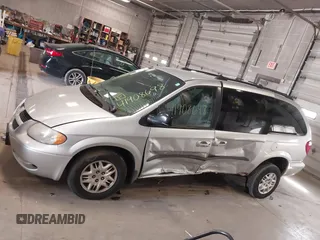 2003 Dodge Grand Caravan with VIN 2D4GP44353R166193, listed as a IAAI auction lot 41908698 with 181,371 mi miles and . Bid and sale history available at DreamBid. Image 14.