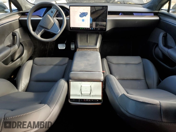 2023 Tesla Model S with VIN 5YJSA1E57PF507456, listed as a Copart auction lot 44649945 with 8,760 mi miles and Salvage title. Bid and sale history available at DreamBid. Image 8.