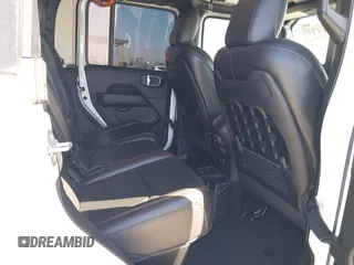 2022 Jeep Gladiator Mojave z VIN 1C6JJTEG0NL103523, wystawiony jako IAAI lot #41842011 z przebiegiem 36 160 mil mil oraz . Historia ofert i sprzedaży dostępna na DreamBid. Obrazek 8.