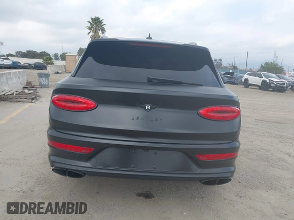 2021 Bentley Bentayga V8 z VIN SJAAM2ZV5MC038171, wystawiony jako IAAI lot #42057762 z przebiegiem 25 973 mil mil oraz . Historia ofert i sprzedaży dostępna na DreamBid. Obrazek 16.