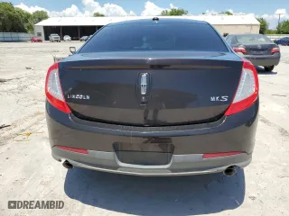 2013 Lincoln MKS with VIN 1LNHL9DK0DG615859, listed as a Copart auction lot 66994754 with 105,133 mi miles and Salvage Title. Bid and sale history available at carsss.com. Image 6.