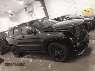 2019 Jeep Grand Cherokee Laredo E with VIN 1C4RJFAG6KC819518, listed as a IAAI auction lot 41856979 with 49,155 mi miles. Bid and sale history available at carsss.com. Image 13.