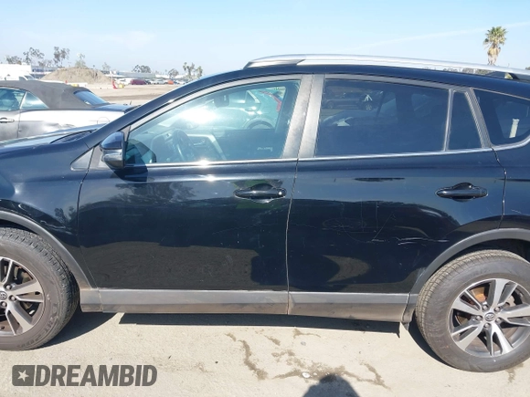 2016 Toyota RAV4 XLE with VIN 2T3RFREV6GW459313, listed as a IAAI auction lot 42074337 with 149,914 mi miles and . Bid and sale history available at DreamBid. Image 14.