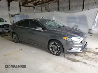 2017 Ford Fusion SE with VIN 3FA6P0HDXHR213441, listed as a Copart auction lot 53442915 with 128,624 mi miles and Salvage title. Bid and sale history available at DreamBid. Image 4.