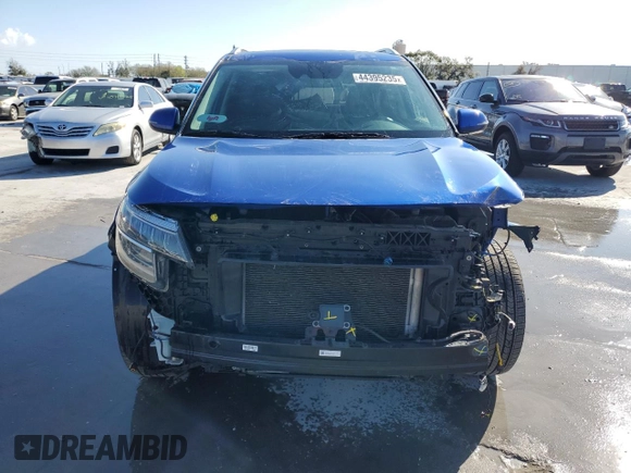 2021 Kia Seltos SX with VIN KNDETCA21M7072840, listed as a Copart auction lot 44395235 with 56,496 mi miles and Salvage Title. Bid and sale history available at carsss.com. Image 5.