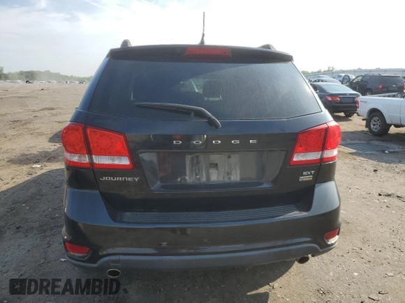 2013 Dodge Journey SXT with VIN 3C4PDCBG4DT619319, listed as a Copart auction lot 62964135 with 140,620 mi miles and Salvage title. Bid and sale history available at DreamBid. Image 6.