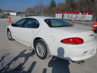 2001 Chrysler LHS with VIN 2C3HC56G61H535038, listed as a IAAI auction lot 41717580 with 123,103 mi miles. Bid and sale history available at carsss.com. Image 3.