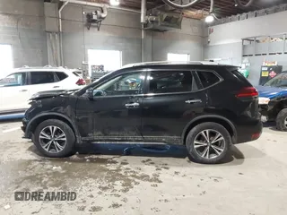 2019 Nissan Rogue SV with VIN JN8AT2MV8KW394025, listed as a IAAI auction lot 41473221 with 105,698 mi miles. Bid and sale history available at carsss.com. Image 14.