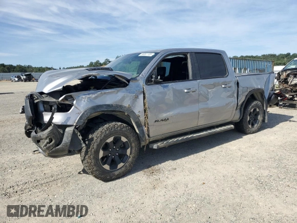 2020 Ram 1500 Rebel with VIN 1C6SRFLT0LN215917, listed as a Copart auction lot 58087705 with 69,683 mi miles and Salvage title. Bid and sale history available at DreamBid. Image 1.