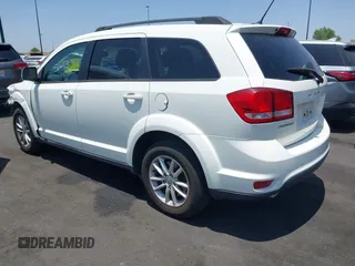2013 Dodge Journey SXT with VIN 3C4PDCBG4DT696966, listed as a IAAI auction lot 42555632 with 144,927 mi miles and . Bid and sale history available at DreamBid. Image 3.