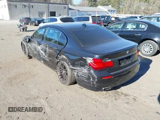 2015 BMW 7 Series 750Li xDrive with VIN WBAYF8C56FD654698, listed as a IAAI auction lot 41229313 with 120,238 mi miles and . Bid and sale history available at carsss.com. Image 3.