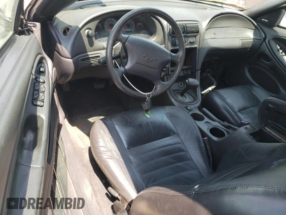 2003 Ford Mustang GT Deluxe with VIN 1FAFP45X43F387520, listed as a Copart auction lot 56302185 with 134,537 mi miles and Salvage title. Bid and sale history available at DreamBid. Image 8.