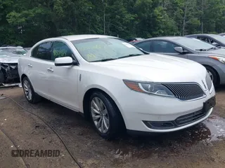 2013 Lincoln MKS z VIN 1LNHL9DK6DG600928, wystawiony jako IAAI lot #42502424 z przebiegiem 194 015 mil mil oraz . Historia ofert i sprzedaży dostępna na DreamBid. Obrazek 1.