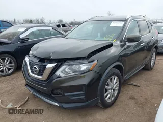 2017 Nissan Rogue S with VIN KNMAT2MTXHP501072, listed as a IAAI auction lot 42001030 with 163,204 mi miles and . Bid and sale history available at DreamBid. Image 17.