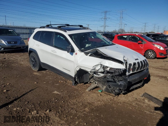 2017 Jeep Cherokee Trailhawk L Plus with VIN 1C4PJMBB3HW506965, listed as a Copart auction lot 82257594 with 106,571 mi miles and Salvage title. Bid and sale history available at DreamBid. Image 4.