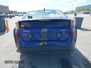 2016 Toyota Prius Two z VIN JTDKBRFU7G3528399, wystawiony jako IAAI lot #41975628 z przebiegiem 188 282 mil mil oraz . Historia ofert i sprzedaży dostępna na DreamBid. Obrazek 16.