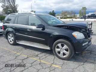 2012 Mercedes-Benz GL-Class GL 450 with VIN 4JGBF7BE6CA785983, listed as a IAAI auction lot 41870613 with 75,004 mi miles. Bid and sale history available at carsss.com. Image 1.