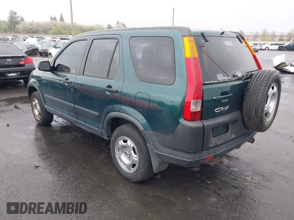 2004 Honda CR-V LX with VIN JHLRD78404C028934, listed as a IAAI auction lot 42023397 with 216,304 mi miles and . Bid and sale history available at carsss.com. Image 3.