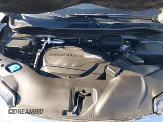 2020 Honda Pilot Touring 8-Passenger with VIN 5FNYF6H95LB021455, listed as a IAAI auction lot 41187609 with 35,589 mi miles and . Bid and sale history available at DreamBid. Image 10.